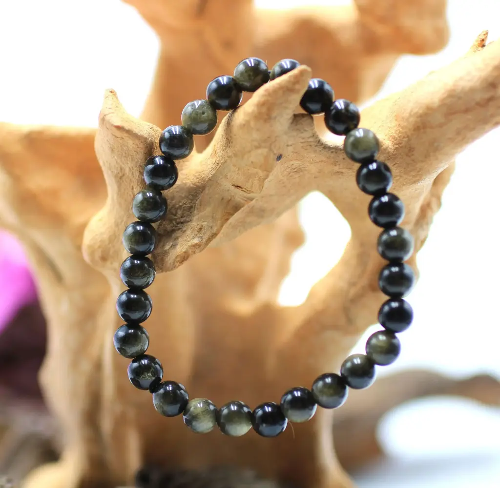 Bracelet en perles 6mm en Obsidienne dorée