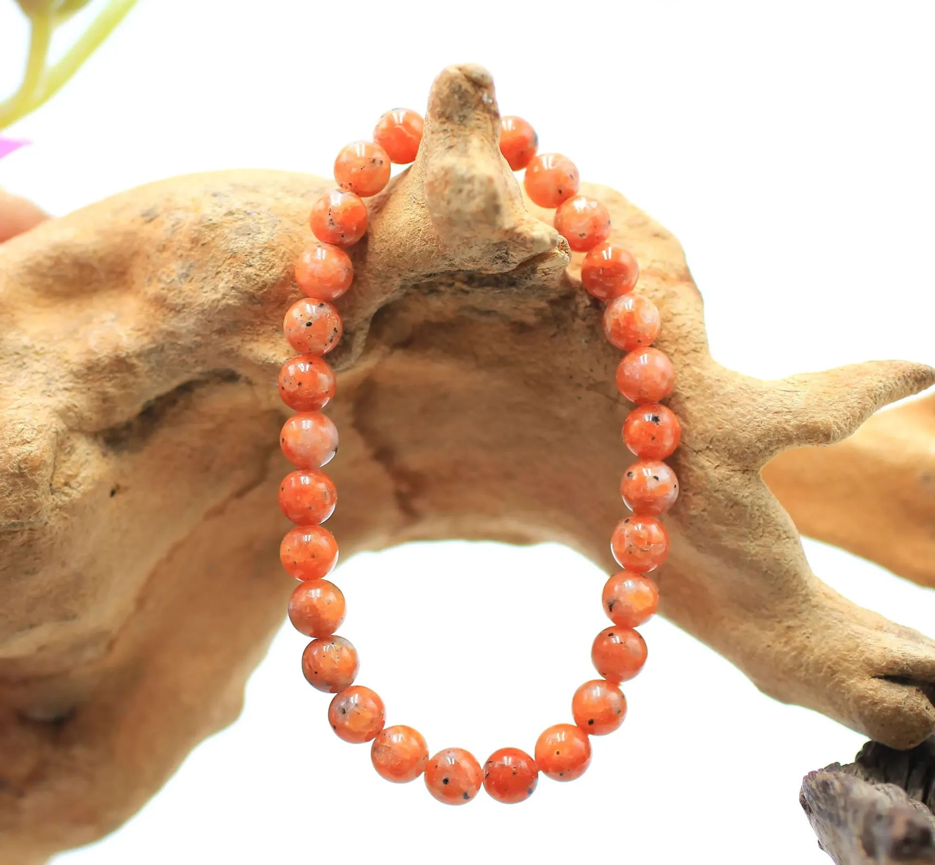 Bracelet en perles 6mm en Calcite rouge