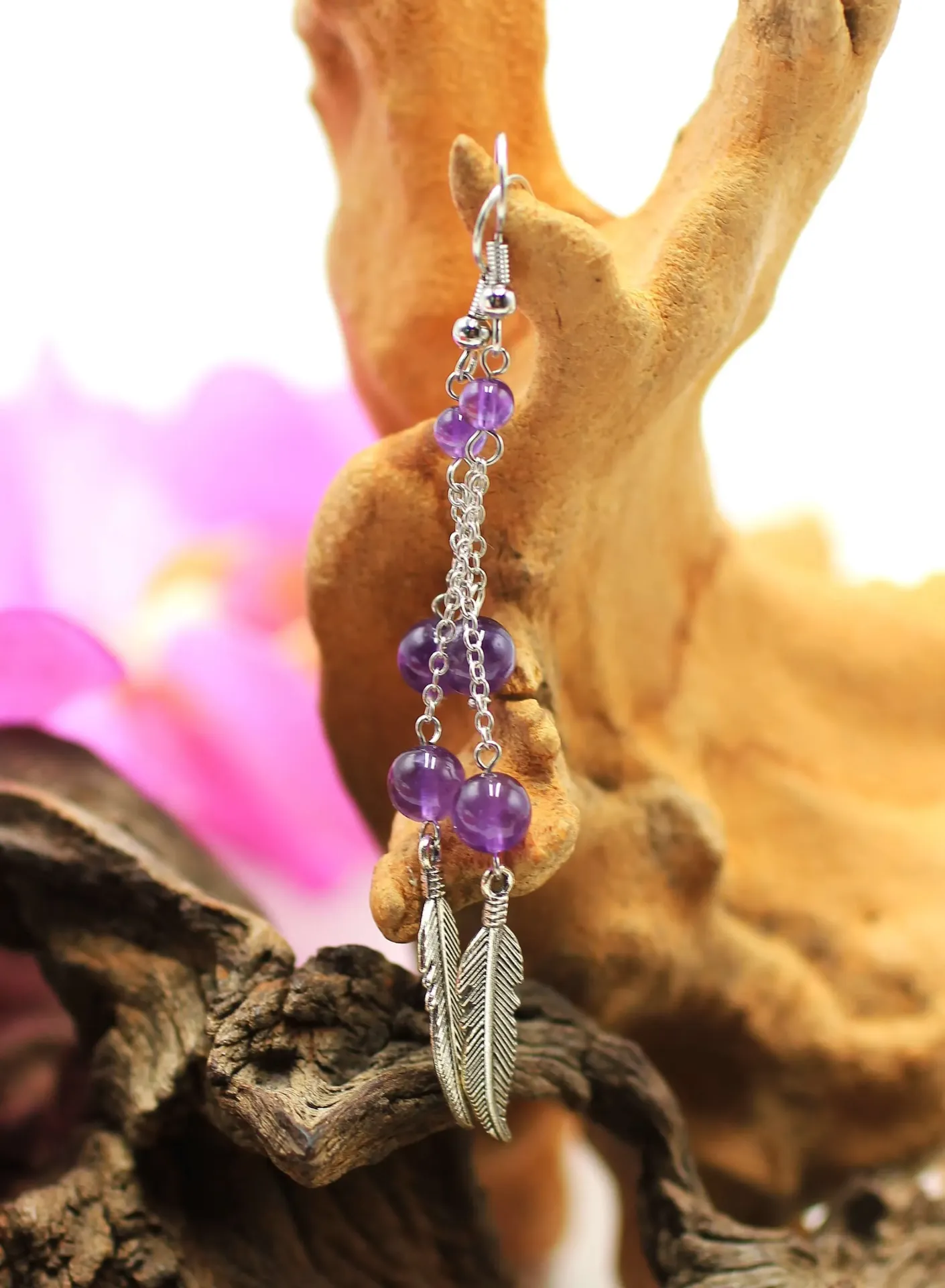 Boucles d'oreille plumes en Acier et en Améthyste