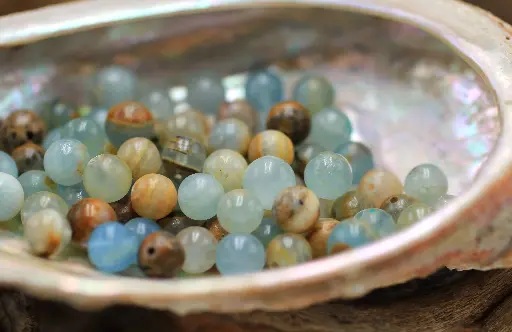 Perle 6mm en Calcite bleue sur gangue