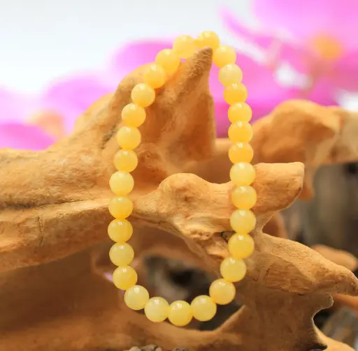 Bracelet en perles 6mm en Calcite orange