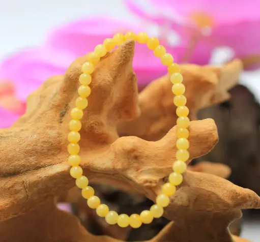 Bracelet en perles 4mm en Calcite orange